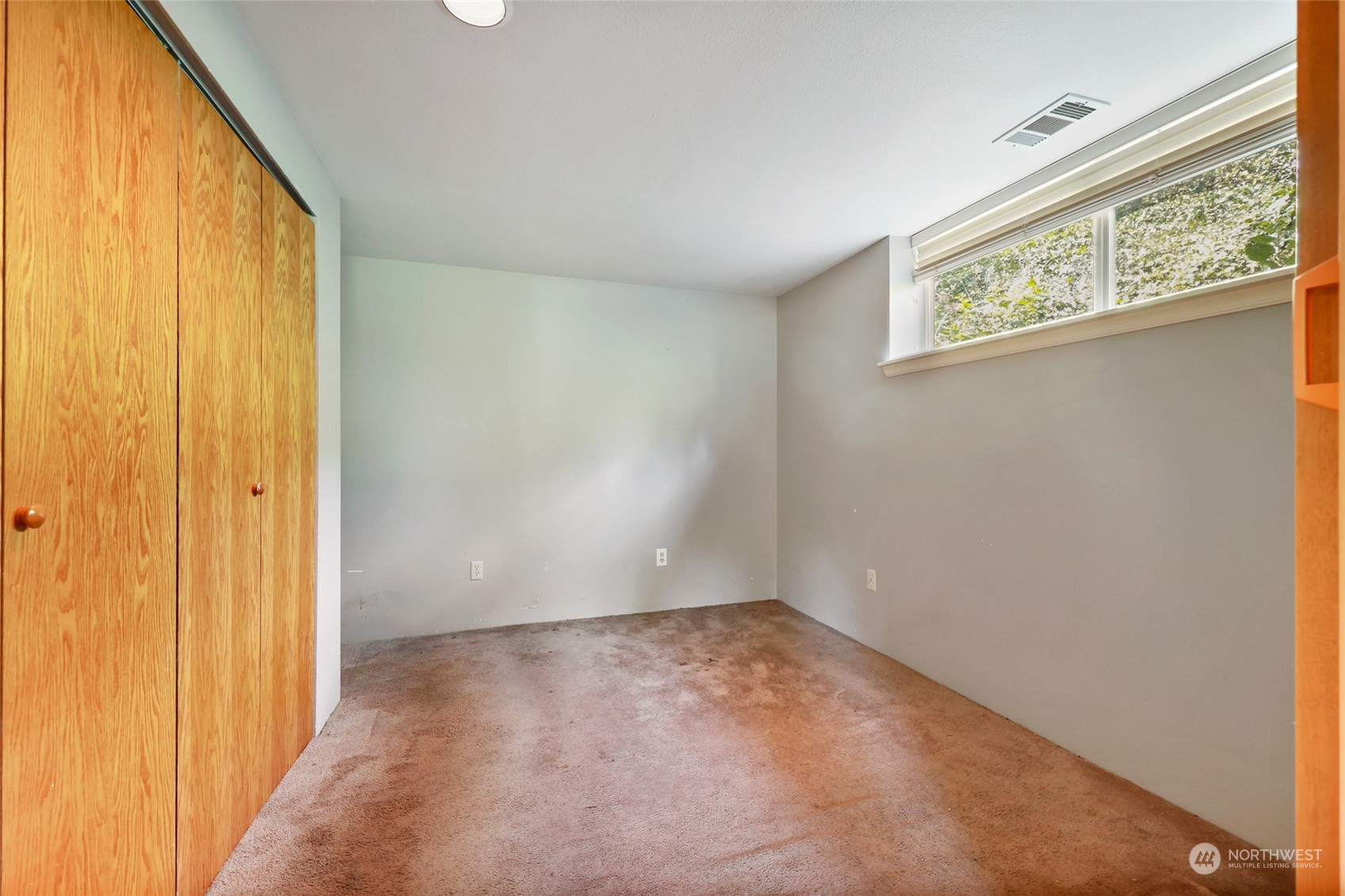 13835 17th Avenue Southwest Burien, WA 98166 - Photo 29 of 33 an empty room with windows