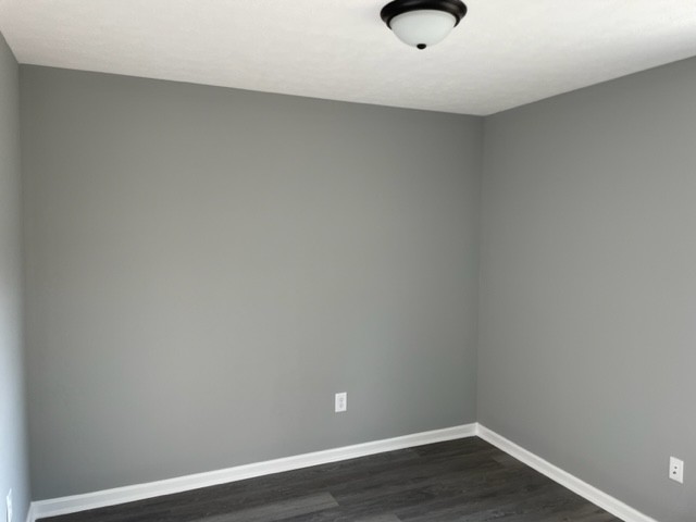354 Riddle Lane Estill Springs, TN 37330 - Photo 4 of 7 a view of an empty room with wooden floor