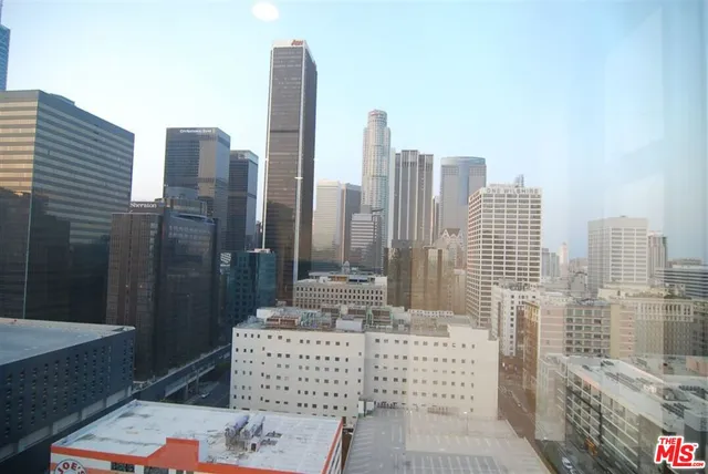 a view of city with tall buildings