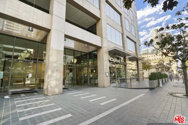 a view of a building with a glass door