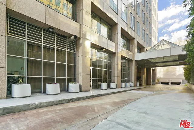 a view of a building with a glass door