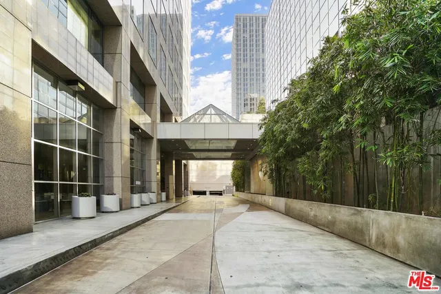 a view of a building with a door and wooden walls