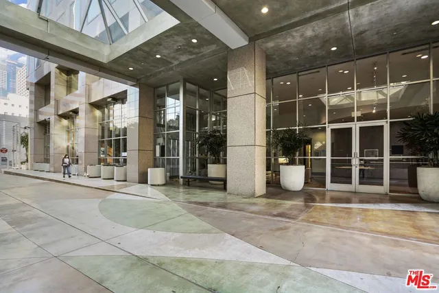 a view of a building with a glass door