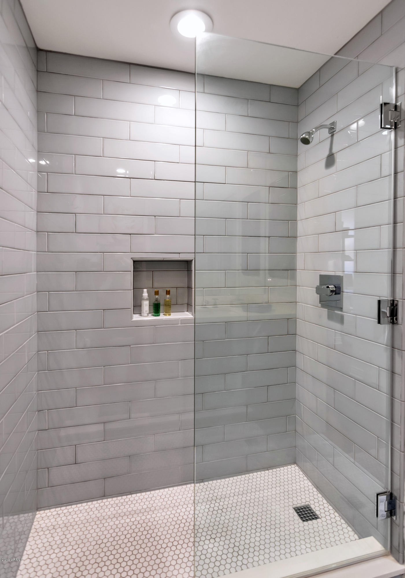 7181 East Camelback Road, Unit 502 Scottsdale, AZ 85251 - Photo 20 of 47 Guest Shower - Marble & Tile