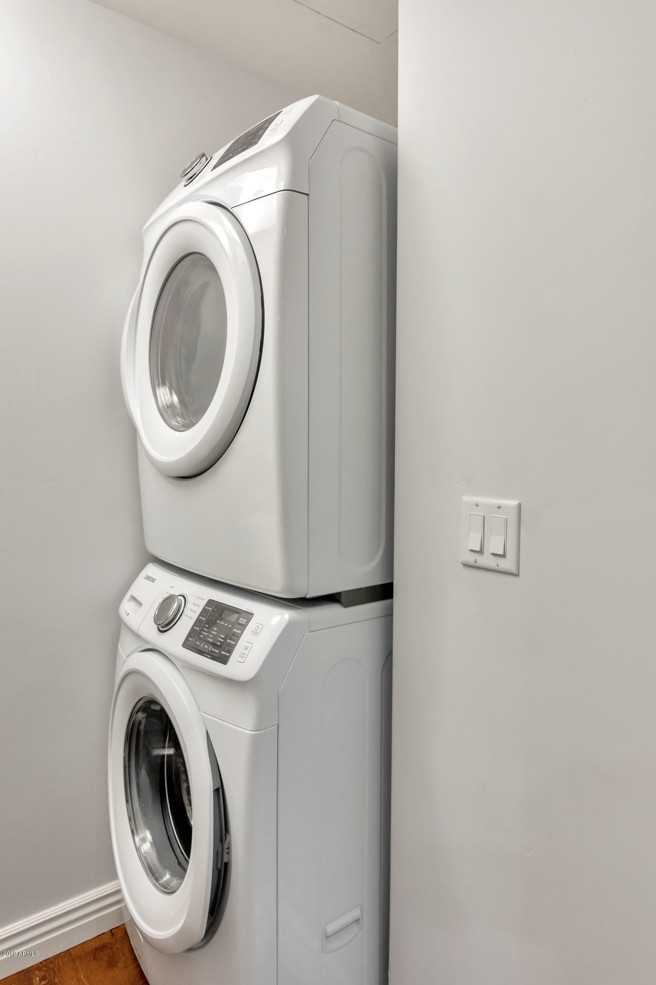 7181 East Camelback Road, Unit 502 Scottsdale, AZ 85251 - Photo 21 of 47 Laundry Room With Washer Dryer