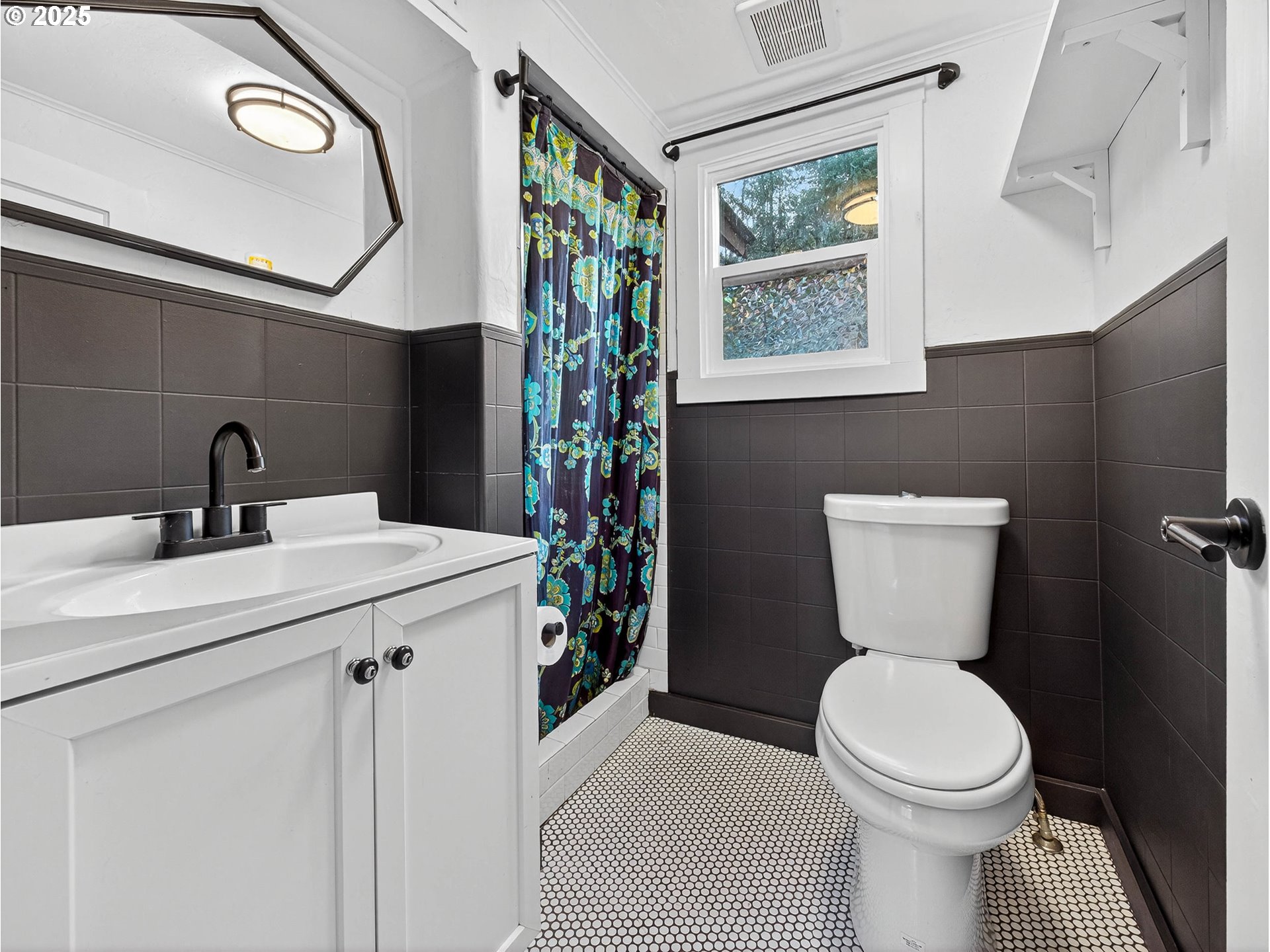 900 Southwest Sadie B Avenue Cascade Locks, OR 97014 - Photo 14 of 29 a bathroom with a toilet sink and mirror