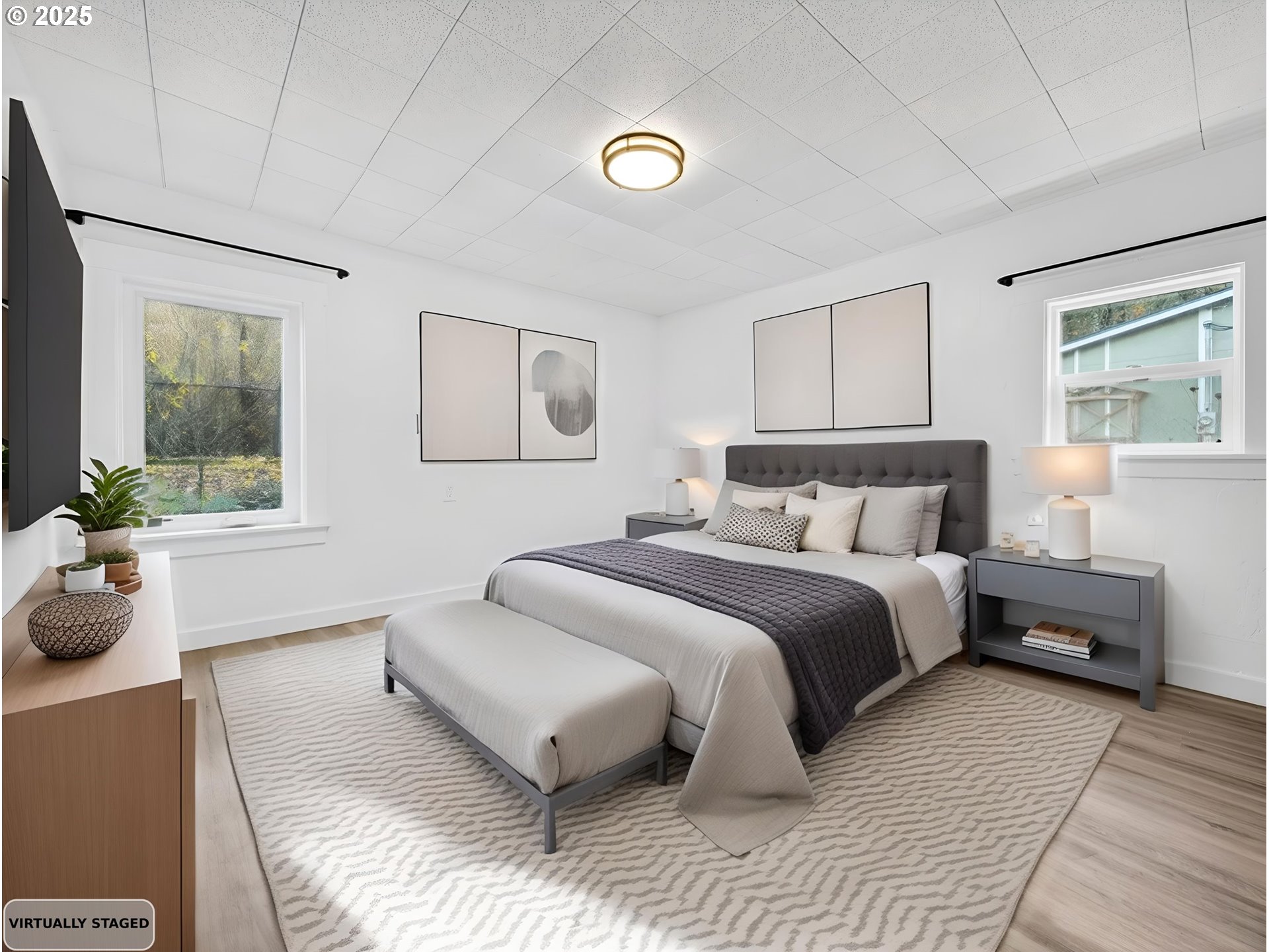 900 Southwest Sadie B Avenue Cascade Locks, OR 97014 - Photo 15 of 29 a bedroom with a large bed and a couch