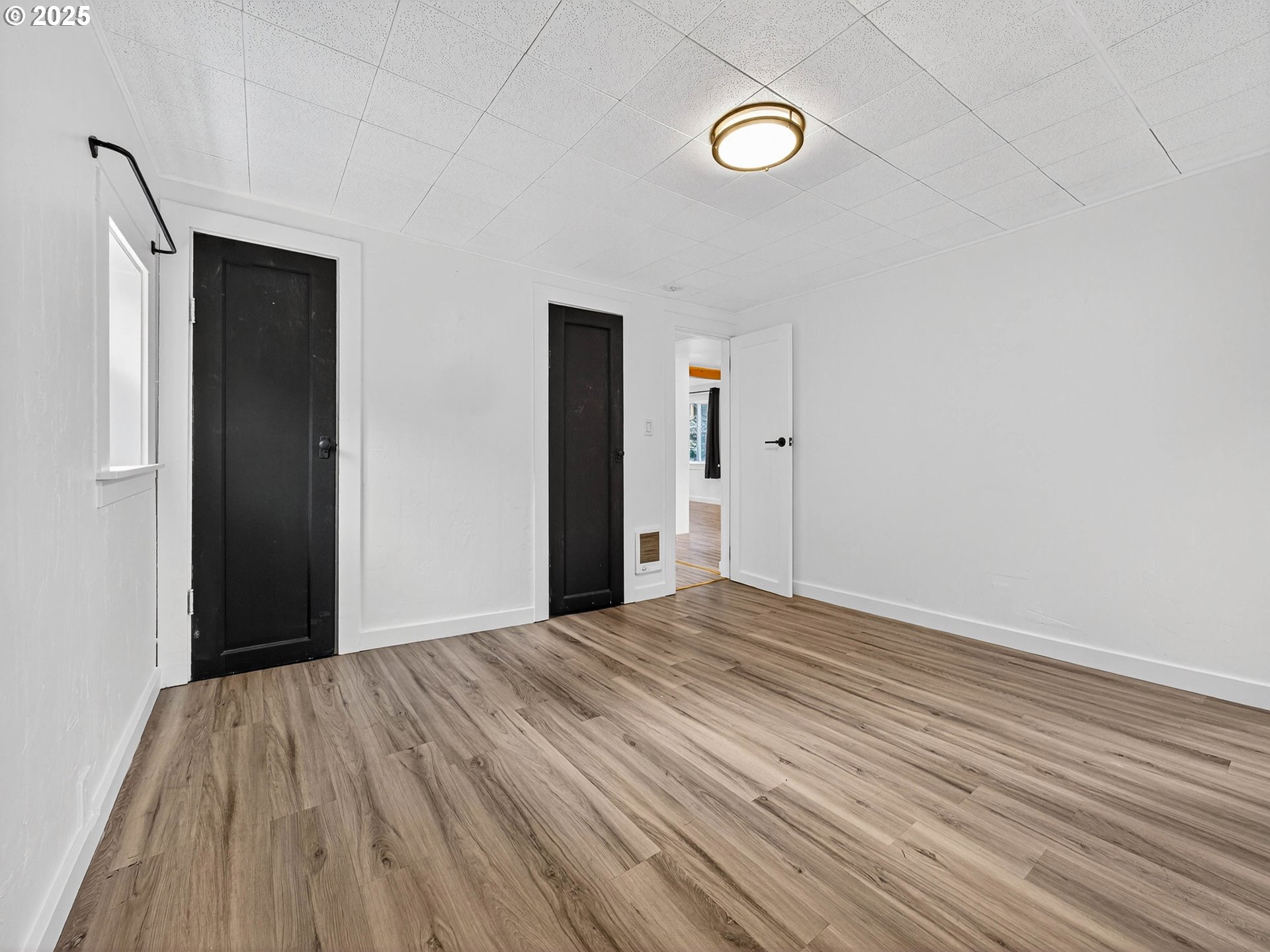 900 Southwest Sadie B Avenue Cascade Locks, OR 97014 - Photo 16 of 29 a view of empty room with wooden floor