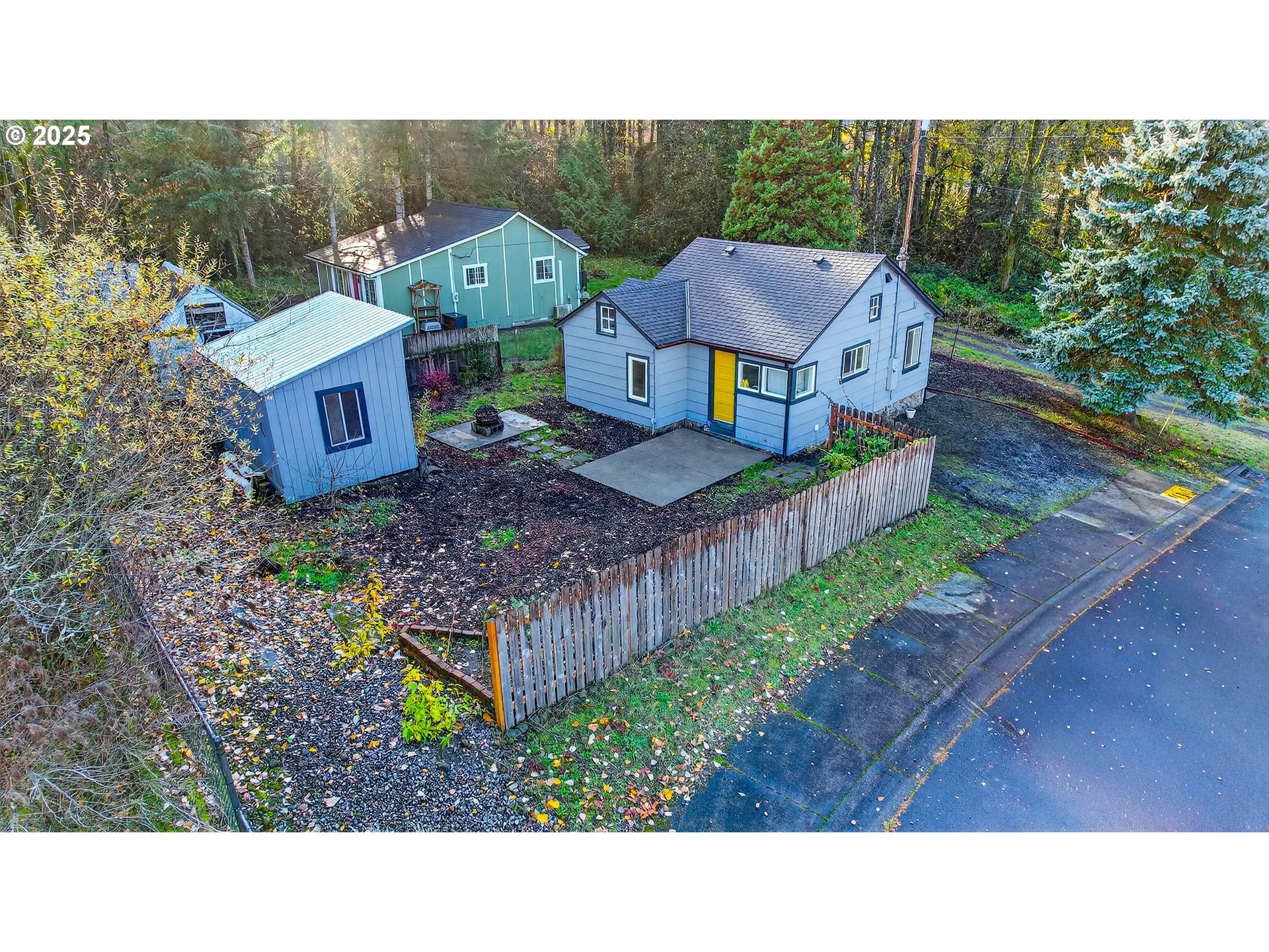 900 Southwest Sadie B Avenue Cascade Locks, OR 97014 - Photo 3 of 29 a aerial view of a house with a garden