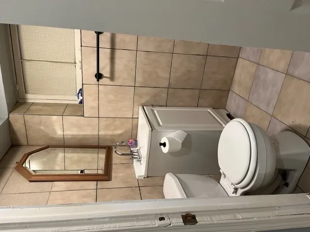 a bathroom with a sink and mirror