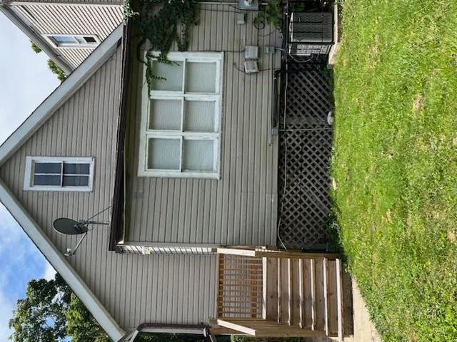 a view of a balcony with door