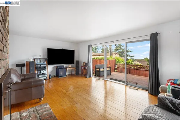 a kitchen with stainless steel appliances granite countertop a stove and a refrigerator