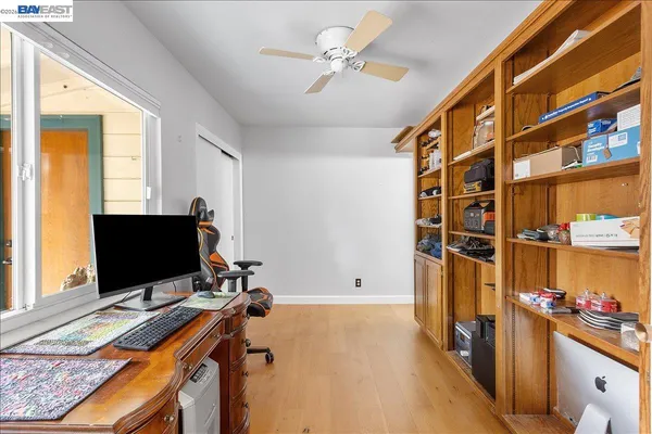 a bathroom with a sink toilet a mirror and shower