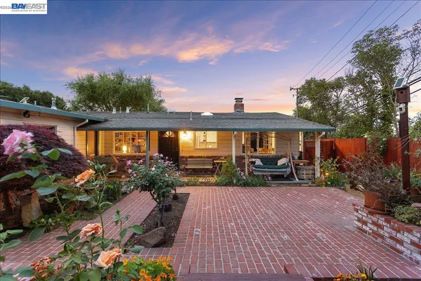 a view of a balcony with chairs