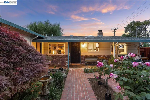 a view of a lake with houses with outdoor space