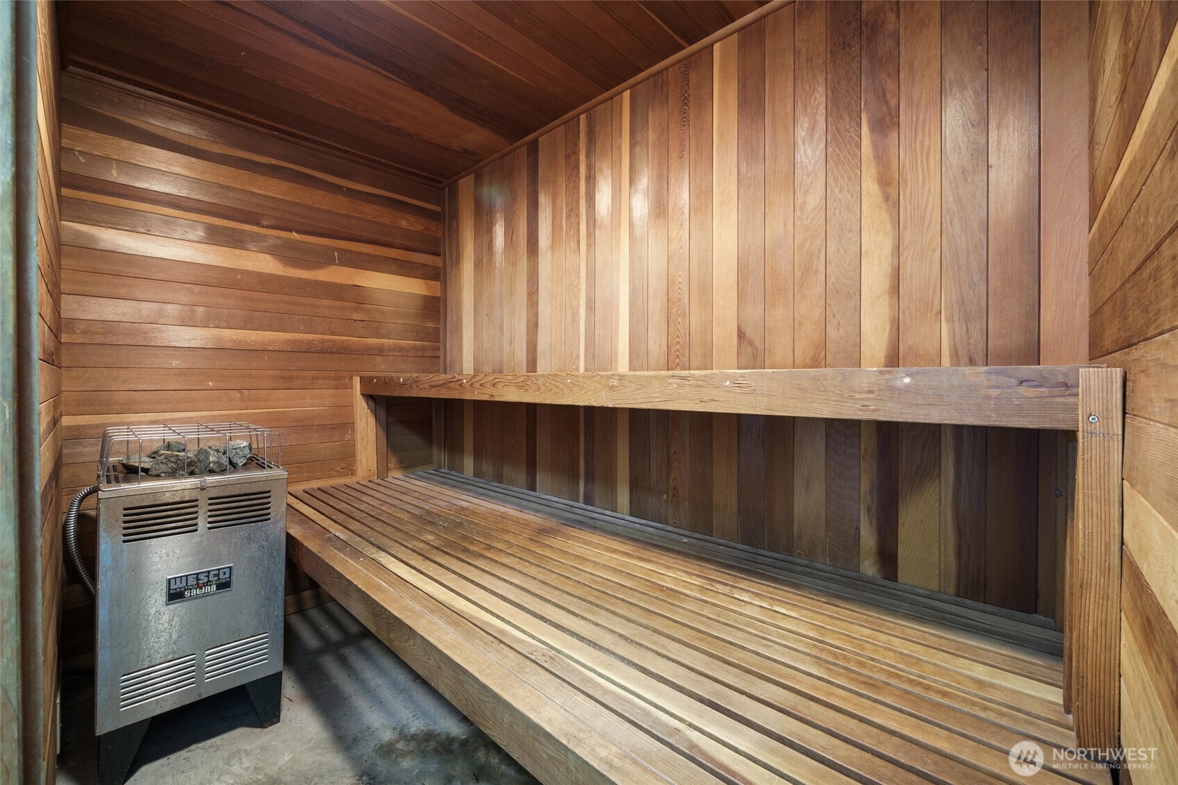 4545 Sand Point Way Northeast, Unit 203 Seattle, WA 98105 - Photo 28 of 28 a kitchen with wooden cabinets and a stove