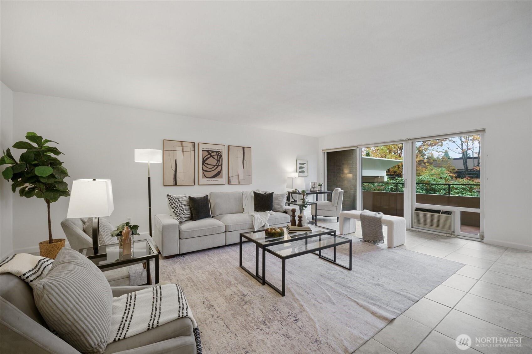 4545 Sand Point Way Northeast, Unit 203 Seattle, WA 98105 - Photo 3 of 28 a living room with furniture and a large window