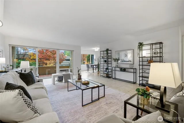 a living room with furniture and a window
