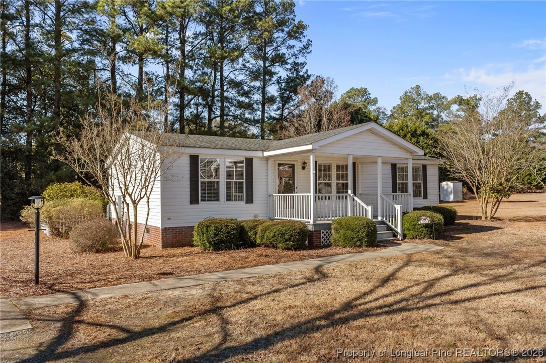 355 Rock Hill Road Fayetteville, NC 28312 - Photo 2 of 38 a front view of a house with a yard