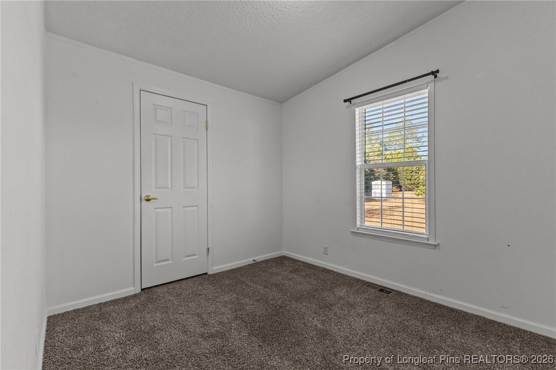355 Rock Hill Road Fayetteville, NC 28312 - Photo 30 of 38 an empty room with a window