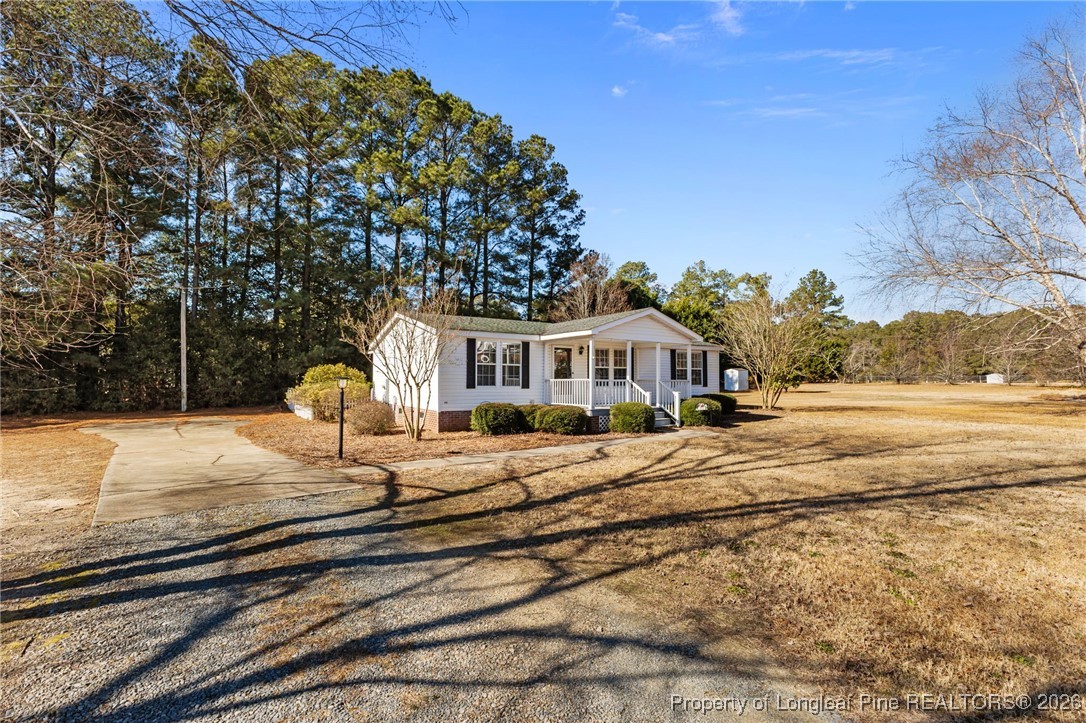 355 Rock Hill Road Fayetteville, NC 28312 - Photo 3 of 38 a front view of a house with yard