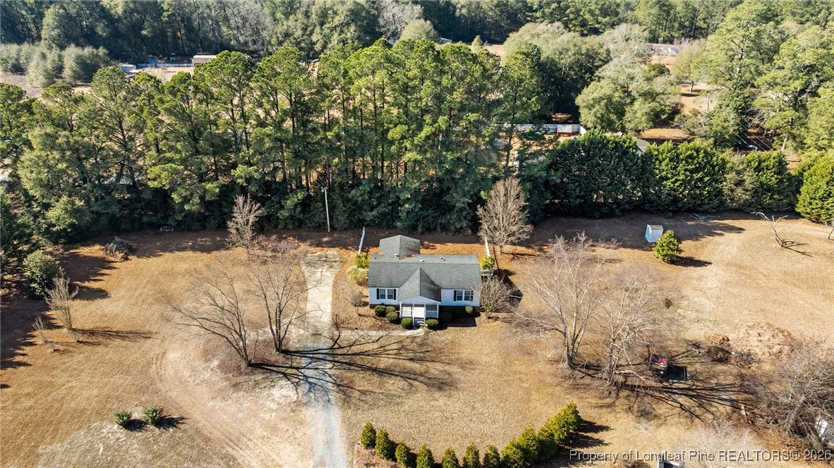 355 Rock Hill Road Fayetteville, NC 28312 - Photo 35 of 38 a view of a lake with a tree