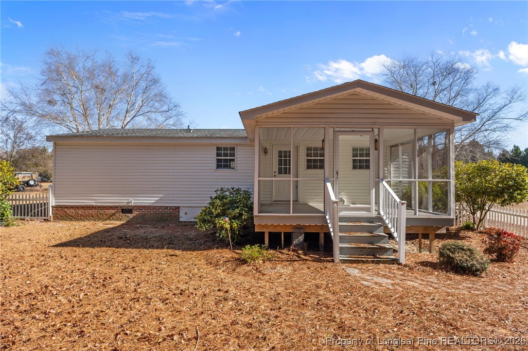 355 Rock Hill Road Fayetteville, NC 28312 - Photo 4 of 38 a front view of a house with garden