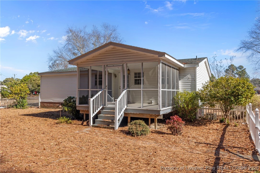 355 Rock Hill Road Fayetteville, NC 28312 - Photo 6 of 38 a front view of a house with patio