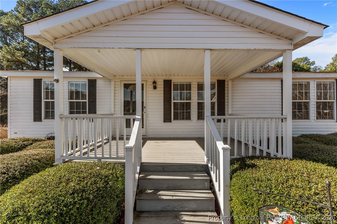 355 Rock Hill Road Fayetteville, NC 28312 - Photo 7 of 38 front view of a house with a porch