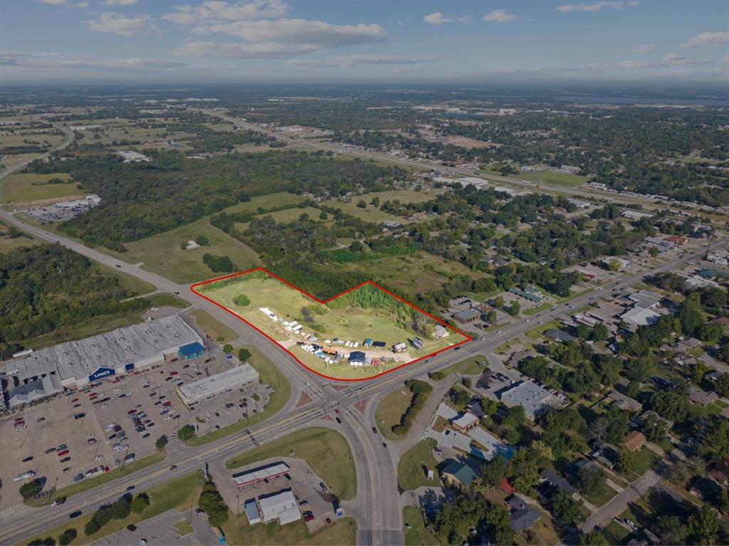 Tbd Tbd Broadway & Wildcat Way Sulphur Springs, TX 75482 - Photo 2 of 9 an aerial view of a residential houses with outdoor space