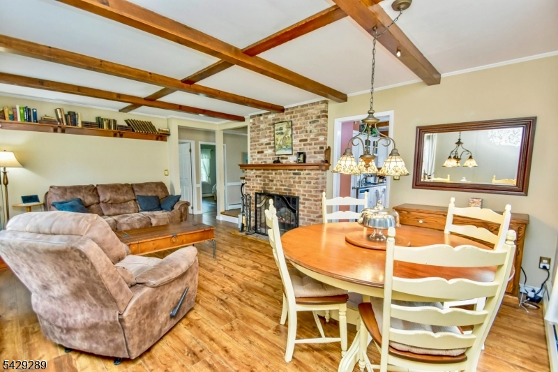 16 Pequot Trail Oak Ridge, NJ 07438 - Photo 3 of 18 a view of a dining room with furniture