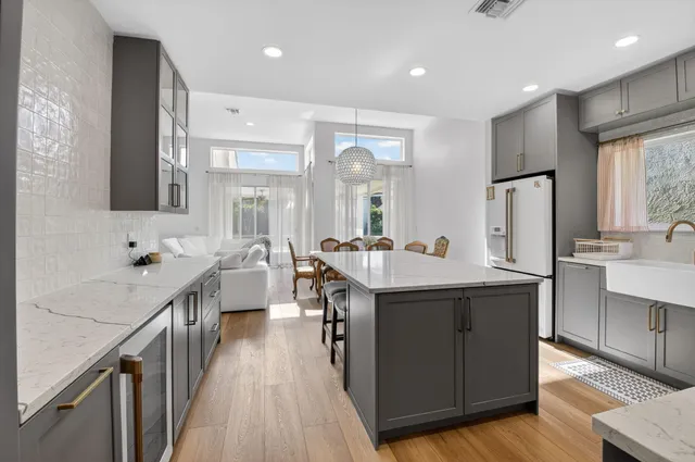 a large kitchen with cabinets