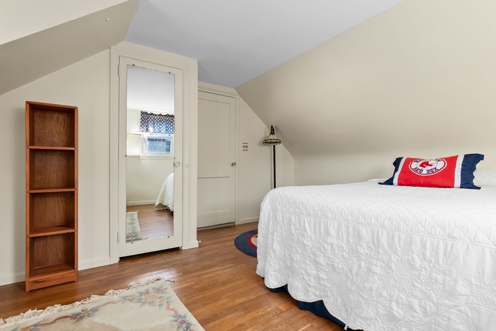 1 Robert Road Danvers, MA 01923 - Photo 22 of 39 a bedroom with a bed and a cabinets