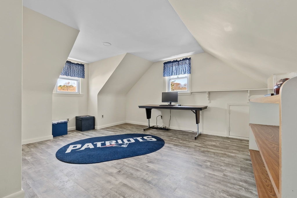 1 Robert Road Danvers, MA 01923 - Photo 24 of 39 a living room with furniture and a wooden floor