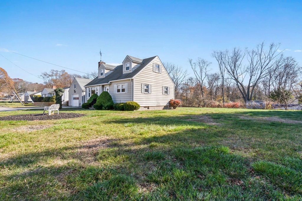 1 Robert Road Danvers, MA 01923 - Photo 33 of 39 a front view of house with yard and green space