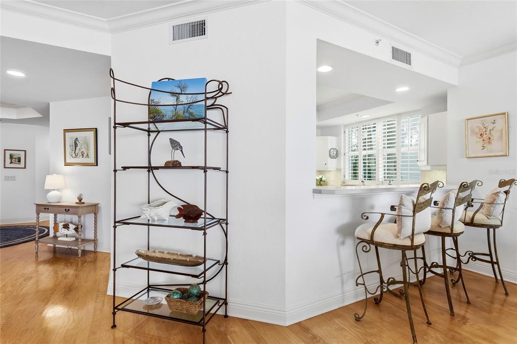 831 Harborshore Drive, Unit 1 Boca Grande, FL 33921 - Photo 12 of 81 a view of a livingroom and dining room and wooden floor