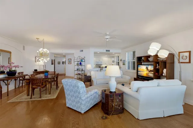 a bed room with a bed mirror and a window