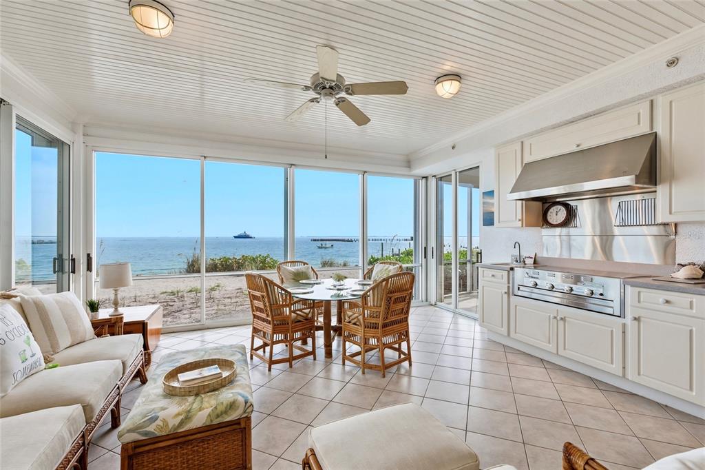 831 Harborshore Drive, Unit 1 Boca Grande, FL 33921 - Photo 19 of 81 a view of a dining room with furniture window and outside view