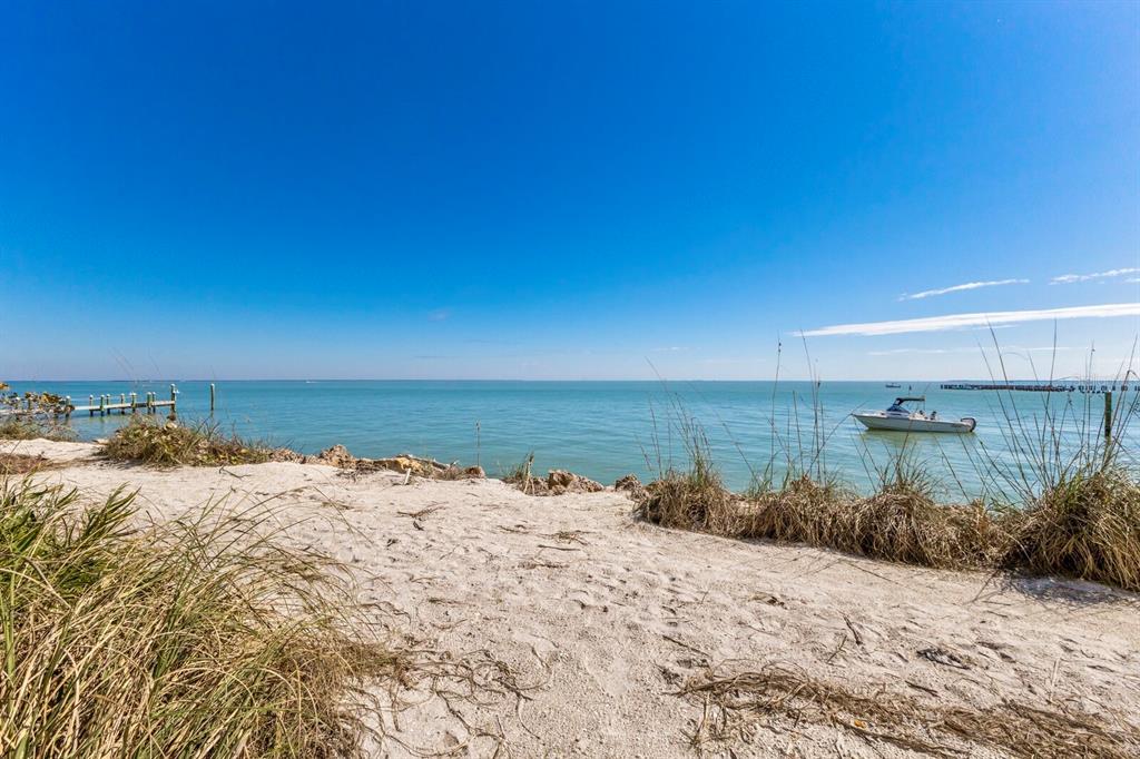 831 Harborshore Drive, Unit 1 Boca Grande, FL 33921 - Photo 22 of 81 a view of ocean view with beach
