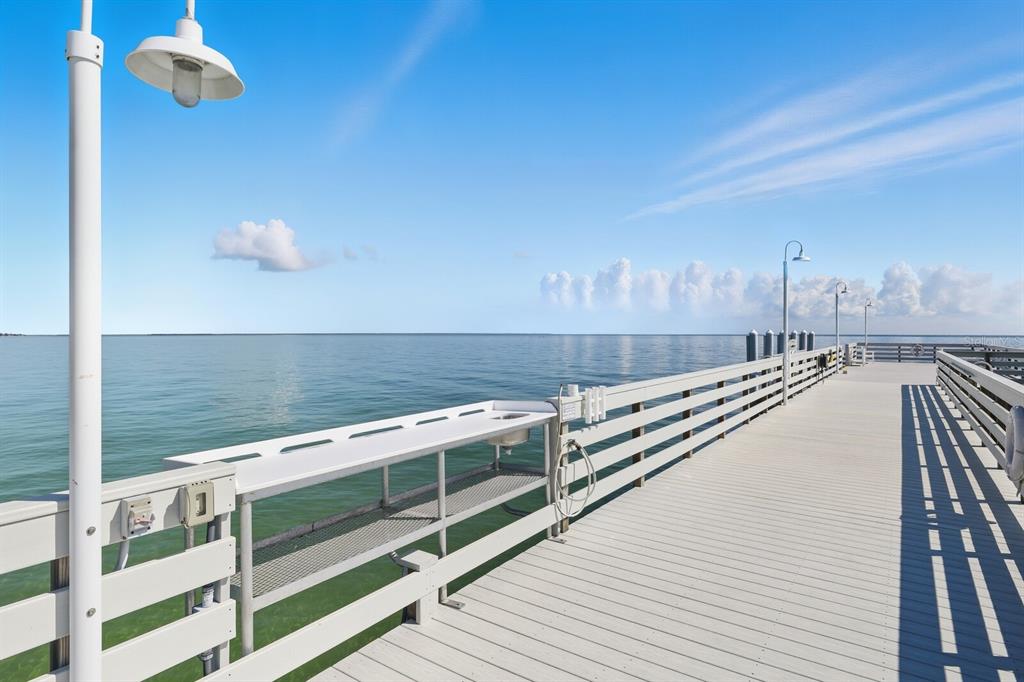 831 Harborshore Drive, Unit 1 Boca Grande, FL 33921 - Photo 52 of 81 a view of a balcony with an outdoor space