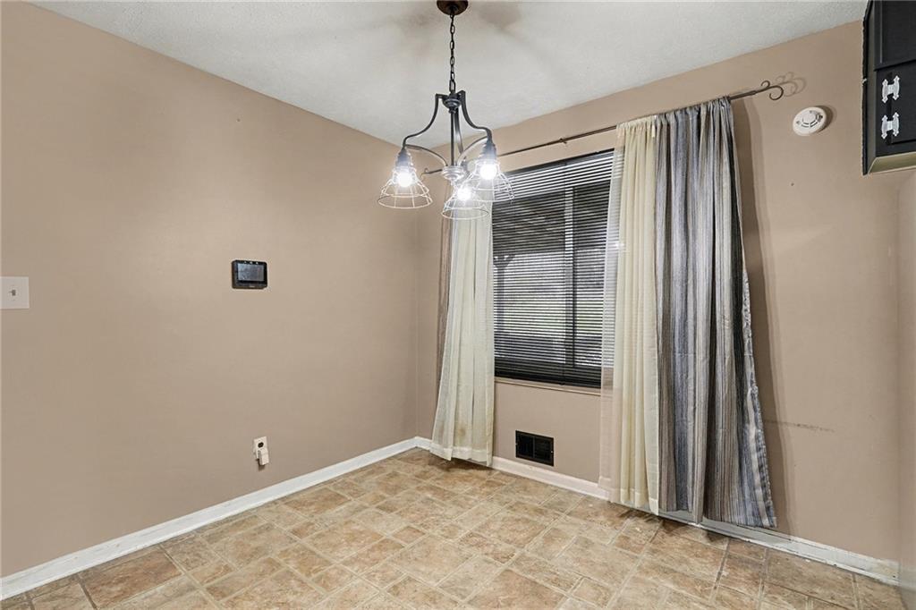1995 Matt Drive Austell, GA 30168 - Photo 11 of 34 a view of a livingroom with a ceiling fan and window