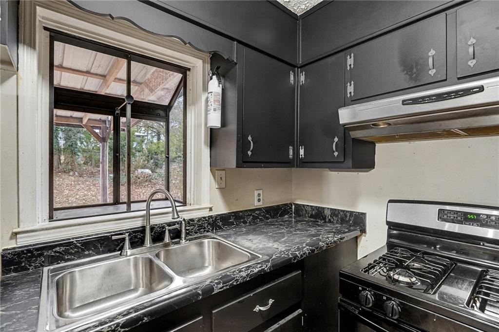 1995 Matt Drive Austell, GA 30168 - Photo 14 of 34 a kitchen with a stove and a sink