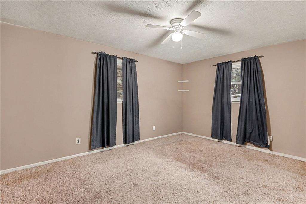 1995 Matt Drive Austell, GA 30168 - Photo 17 of 34 a view of a room with a ceiling fan