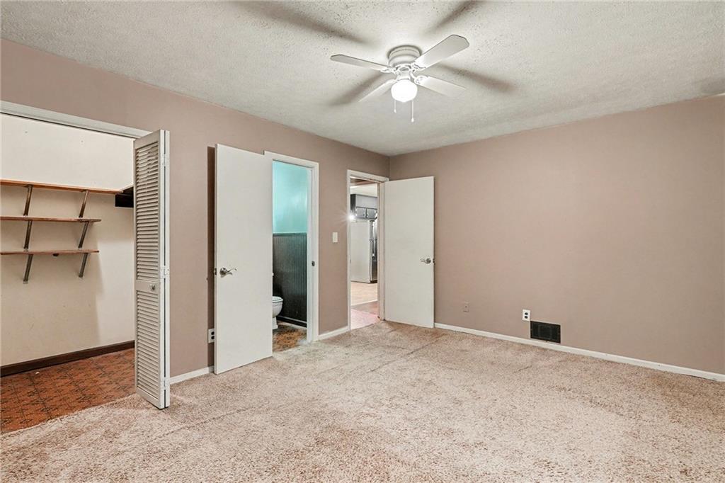 1995 Matt Drive Austell, GA 30168 - Photo 20 of 34 an empty room with closet and windows