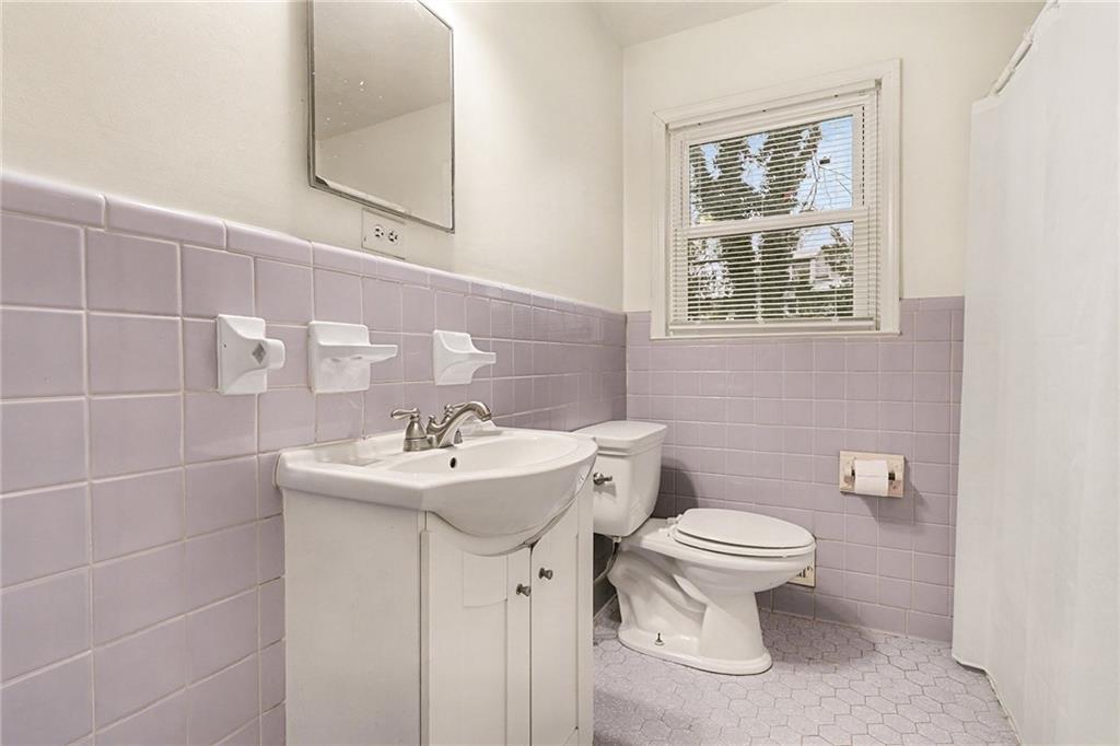 1995 Matt Drive Austell, GA 30168 - Photo 27 of 34 a bathroom with a sink toilet and mirror