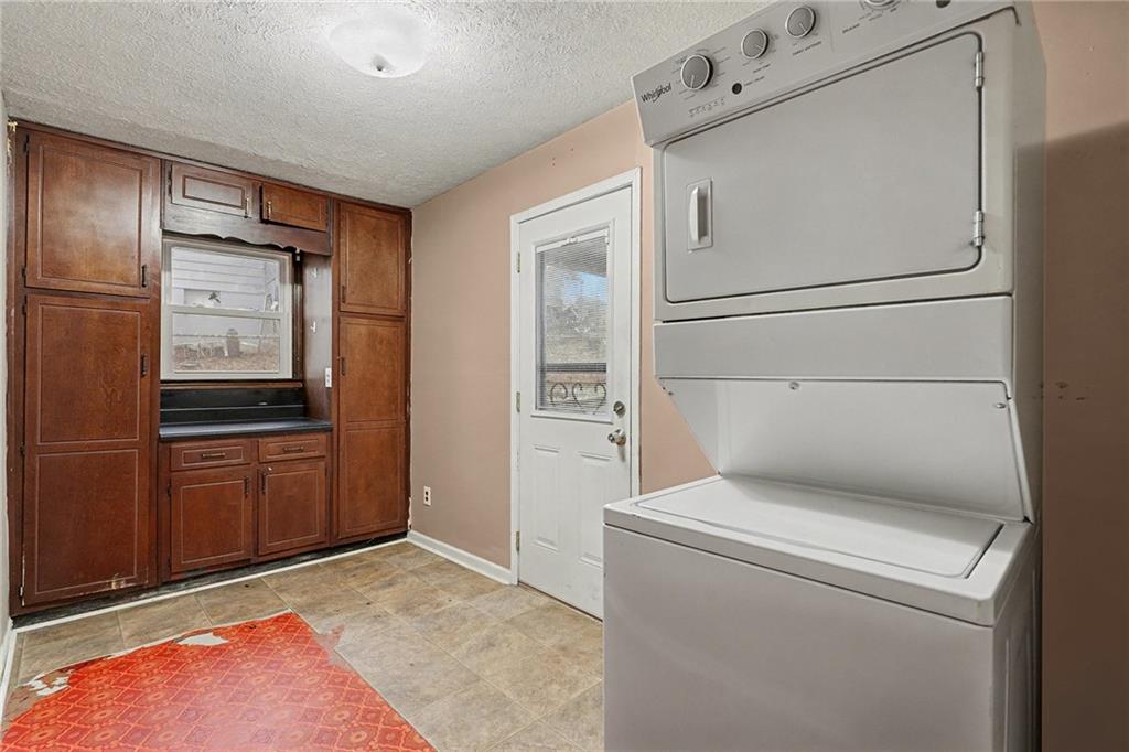 1995 Matt Drive Austell, GA 30168 - Photo 28 of 34 a storage room with cabinets and washer