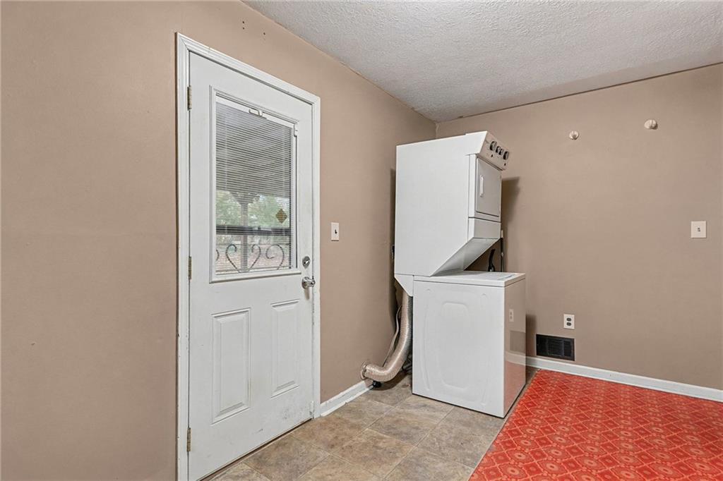 1995 Matt Drive Austell, GA 30168 - Photo 29 of 34 an entryway with a washer and dryer