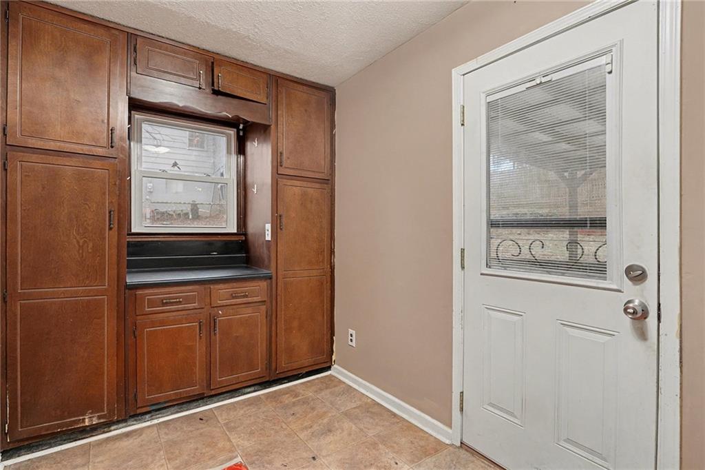 1995 Matt Drive Austell, GA 30168 - Photo 30 of 34 a view of cabinets and wooden door