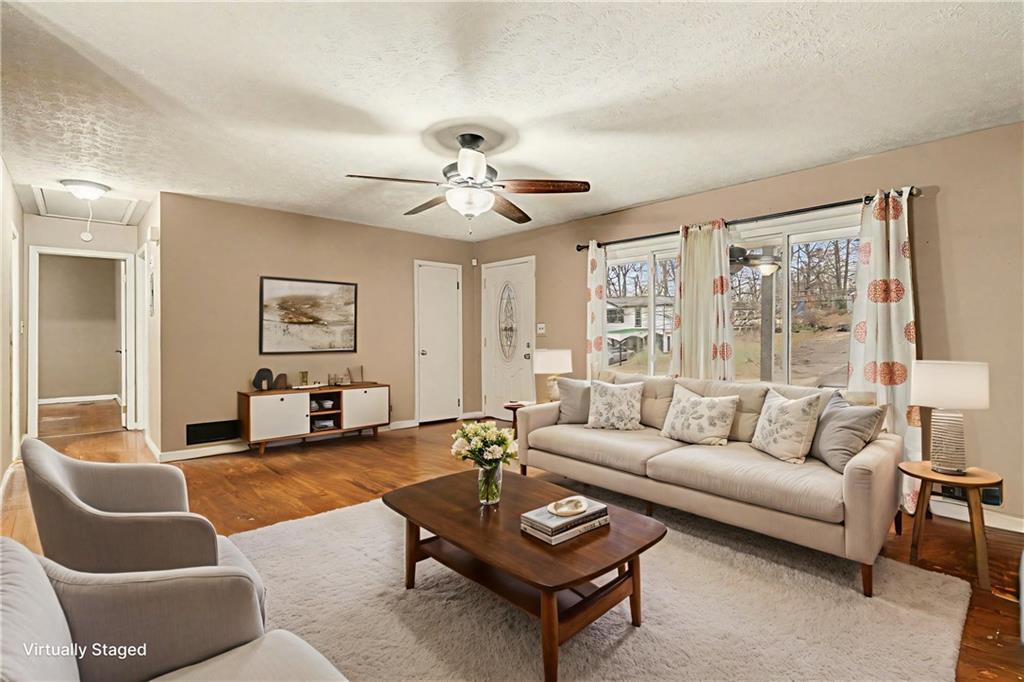 1995 Matt Drive Austell, GA 30168 - Photo 7 of 34 a living room with furniture a table and a large window