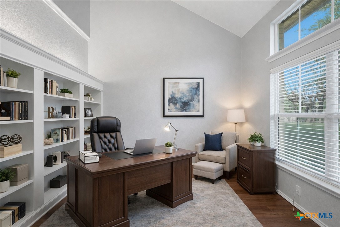 716 Hollow Ridge Schertz, TX 78108 - Photo 6 of 47 Virtually staged Custom bookcases in this spacious office with french doors